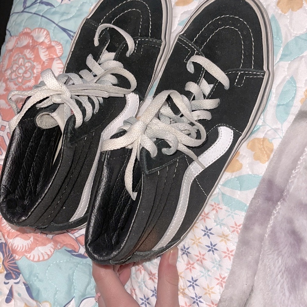 like new (vans off the wall - high top) black and white